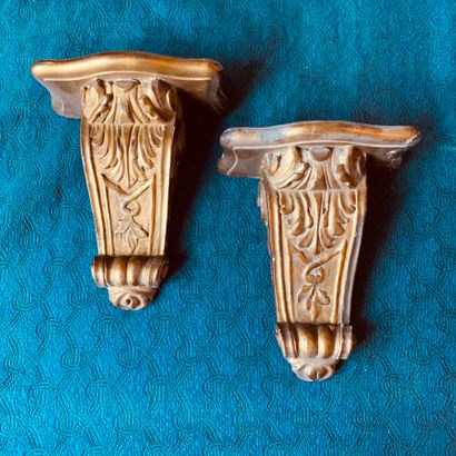 Pair of gilded and carved wood brackets in...