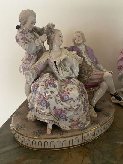 Three statuettes in painted porcelain (two...