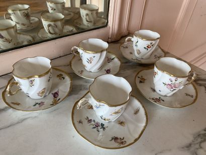 
10 cups and 18 saucers in white porcelain...