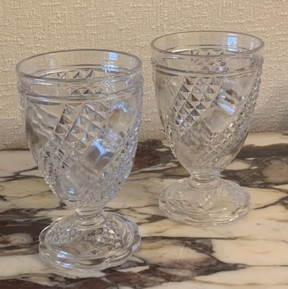 Two Baccarat crystal goblets, signed in relief...