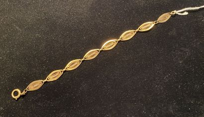 Bracelet en or jaune 18 k (750 millièmes)...