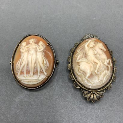 Two brooches in silver plated metal set with...
