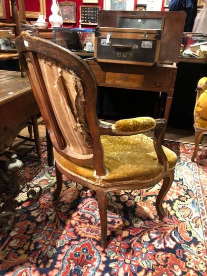 Three cabriolet armchairs in molded and carved...
