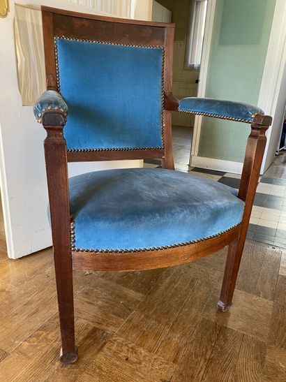 Natural wood armchair upholstered with blue...