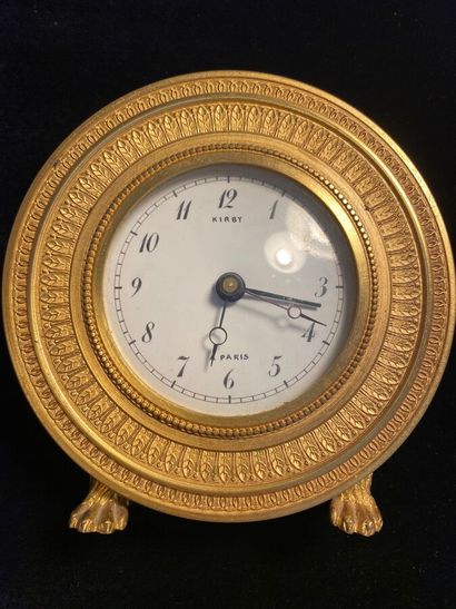 KIRBY BEARD Paris 

Gilded metal clock decorated...