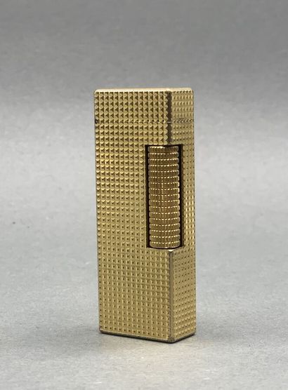 DUNHILL, Lighter in gilded metal (wears)...