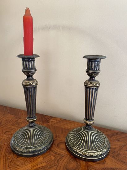 Pair of silver plated metal torches, decorated...