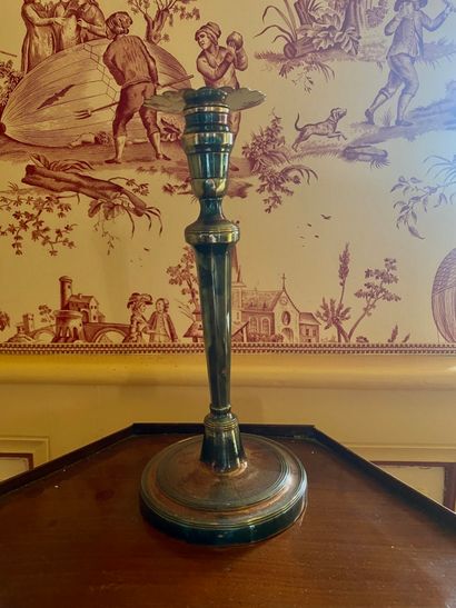 Candlestick in metal, the circular base with...