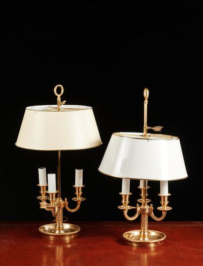 Paire de lampes bouillottes en métal doré...