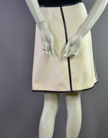 COURRÈGES PARIS Jupe trapèze en laine beige...