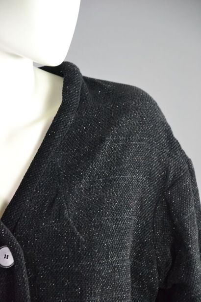 ROCHAS Manteau noir et lurex T 42

Le modèle...