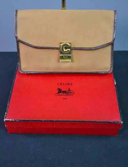 CELINE PARIS Pochette en toile marron gansé...
