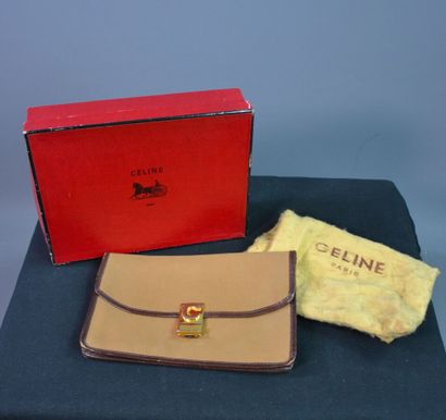 CELINE PARIS Pochette en toile marron gansé...