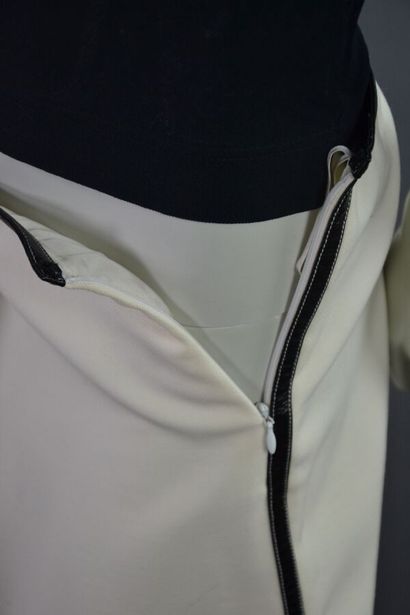 COURRÈGES PARIS Jupe trapèze en laine beige...