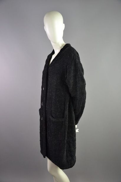 ROCHAS Manteau noir et lurex T 42

Le modèle...