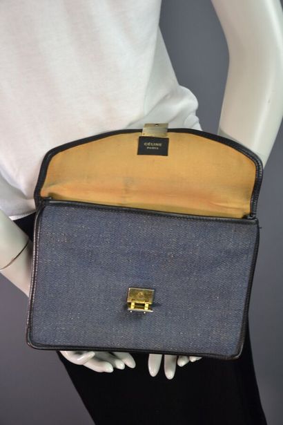 CELINE PARIS Pochette en toile denim brut...