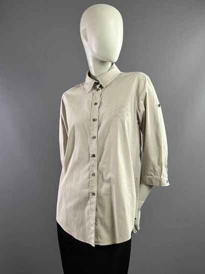 BURBERRY Lot de 2 chemisiers en coton blanc...