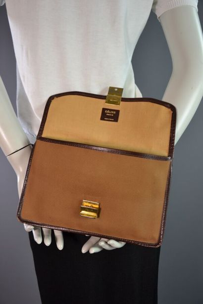 CELINE PARIS Pochette en toile marron gansé...