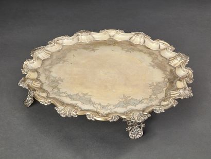 Multi-lobed silver tray with engraved shells...