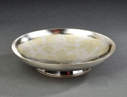 CHRISTOFLE
Silver-plated metal bowl resting...