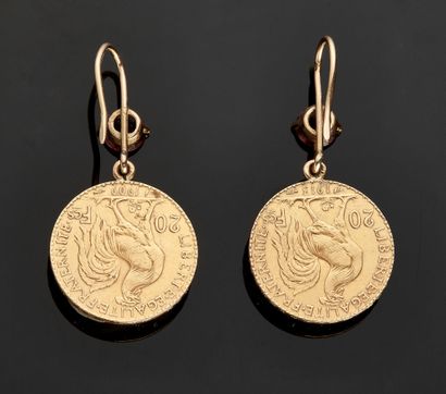 Pair of earrings in yellow gold 18 k (750...