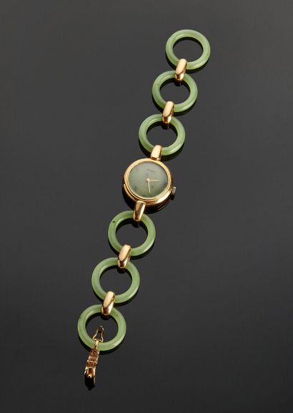 Lady's watch with round dial in yellow gold...