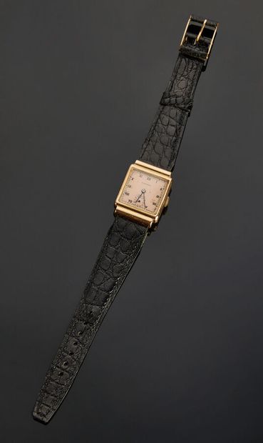 LONGINES
Man's watch with dial in yellow...
