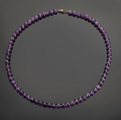 Articulated necklace with amethyst balls.
Length...