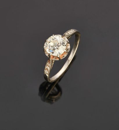 Platinum ring set with an old-cut diamond...