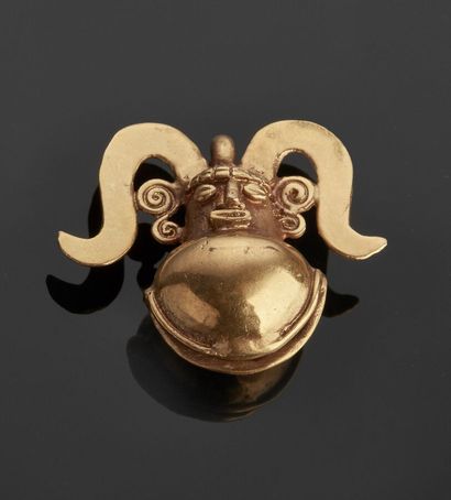 Metal pendant representing a stylized character,...