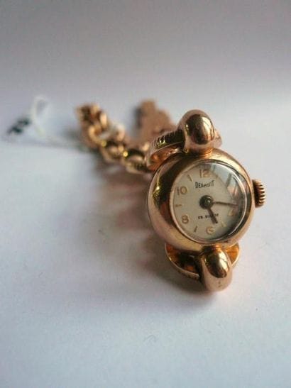 Montre bracelet de dame en or jaune à maillons...