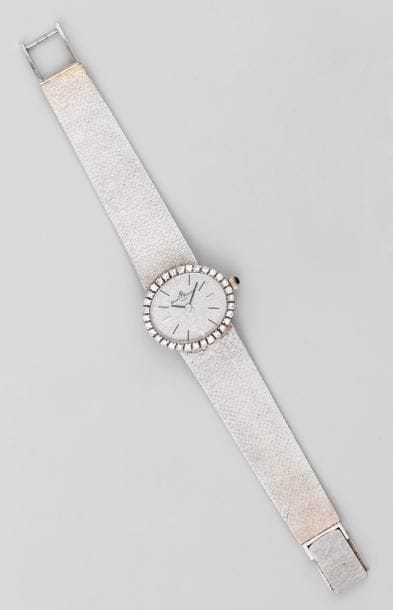 Montre bracelet de dame en or gris à boîtier...