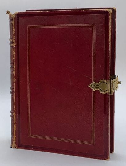 Amicorum album in a damaged red morocco binding...