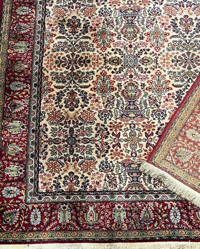 Oriental rug with beige background and blue...