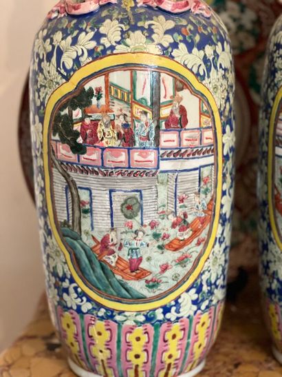 Pair of porcelain baluster vases decorated...