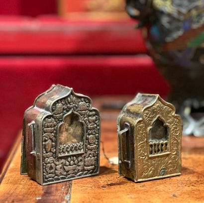 Two Tibetan metal reliquaries (open)
19th...