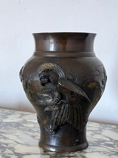 Bronze baluster vase with a rooster in relief...
