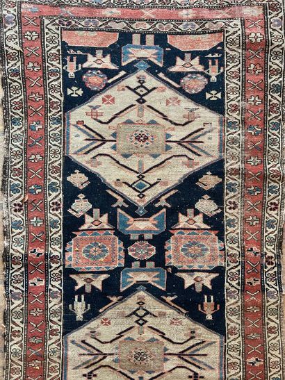 Oriental gallery carpet, decorated with figures...