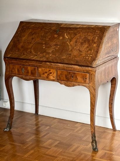 Wood veneer sloping desk opening with a flap...