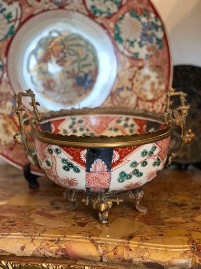 Porcelain bowl with imari decoration. Gilded...