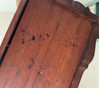 Wood veneer sloping desk opening with a flap...