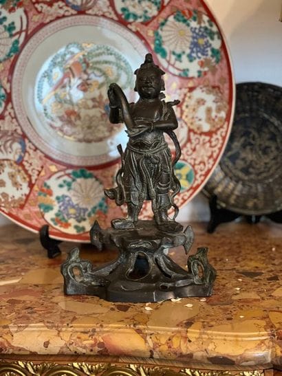 Patinated bronze subject depicting a dignitary...
