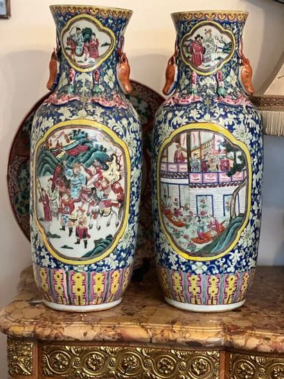 Pair of porcelain baluster vases decorated...