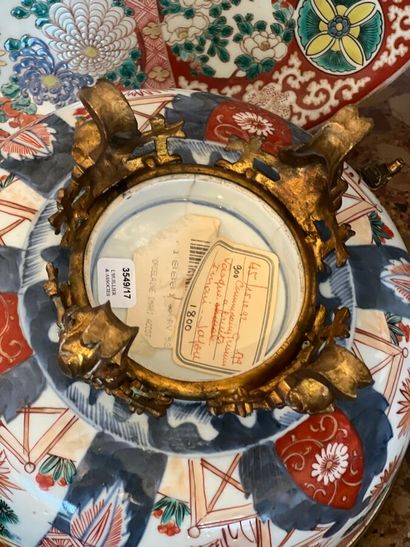 Porcelain bowl with imari decoration. Gilded...