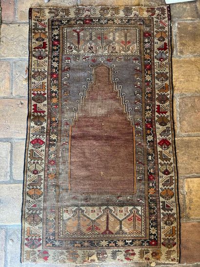 Oriental rug, probably a prayer rug decorated...