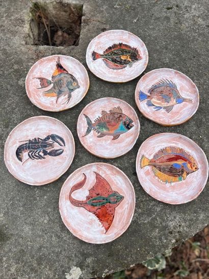 7 glazed earthenware shellfish plates decorated...