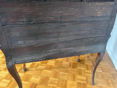 Wood veneer sloping desk opening with a flap...