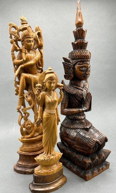 Four Asian-style wooden sculptures of deities
Modern...