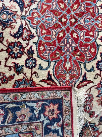 Lot including four carpets: 
- A tappis with...