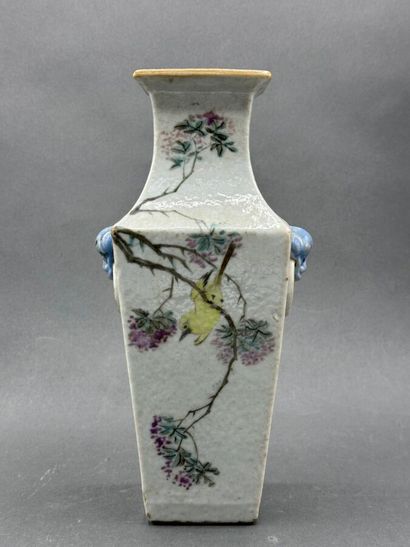 Polychrome enameled porcelain baluster vase...